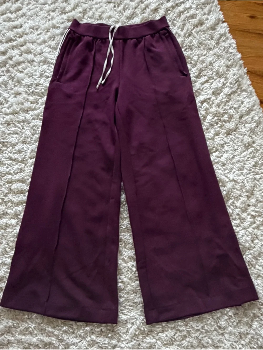 ALO Yoga Wide-Leg Track Pants in Plum with White Side Stripes - Picture 5 of 10